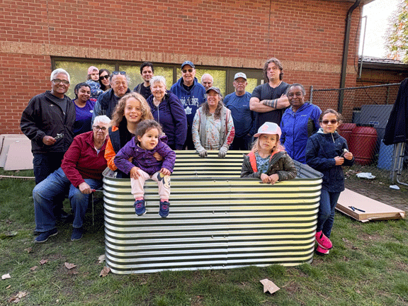 Volunteers assembling a community garden