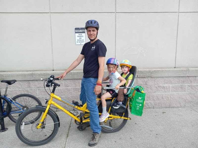 parker and kids on the bike