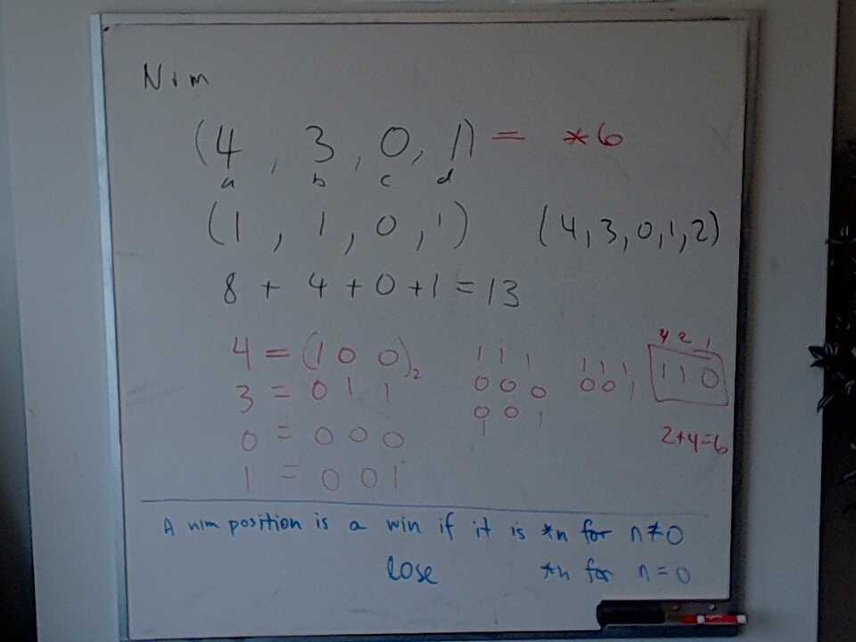 A photo of a whiteboard titled: Nim and Nimbers