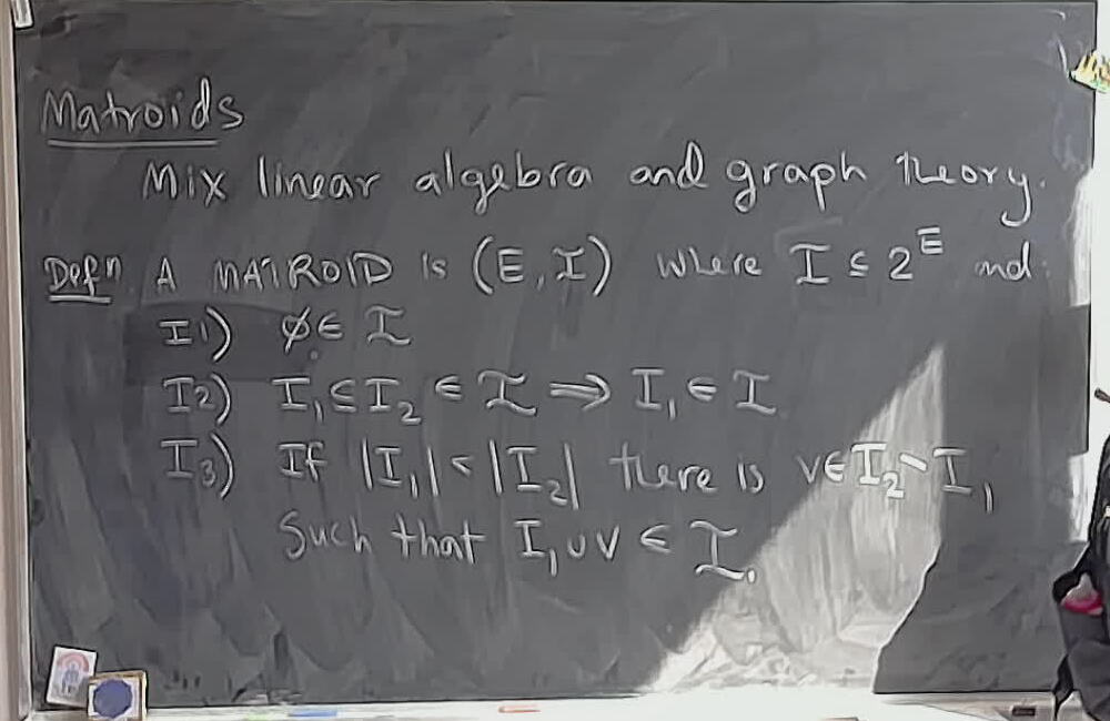 A photo of a whiteboard titled: Matroids: Independent Sets Definition