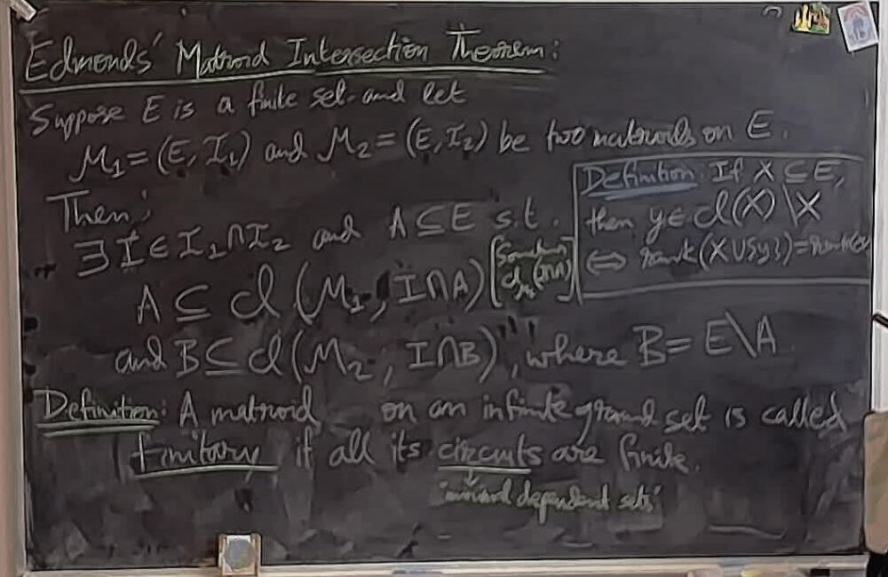 A photo of a whiteboard titled: Edmonds Matroid Intersection Theorem